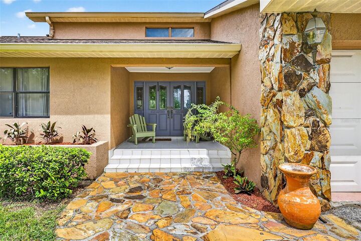 Property Photo: 8410 W Knights Griffin Road FL 33565