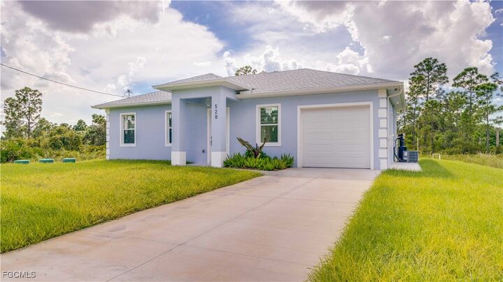 Property Photo:  528 Aspen Avenue S  FL 33974 