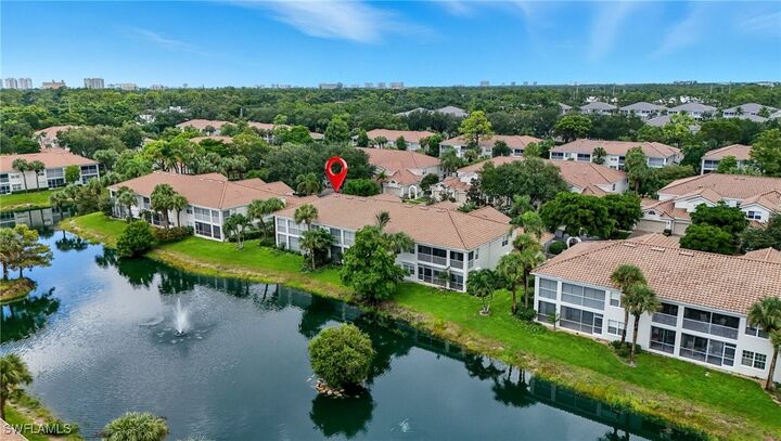 Property Photo:  6894 Rain Lily Road 203  FL 34109 