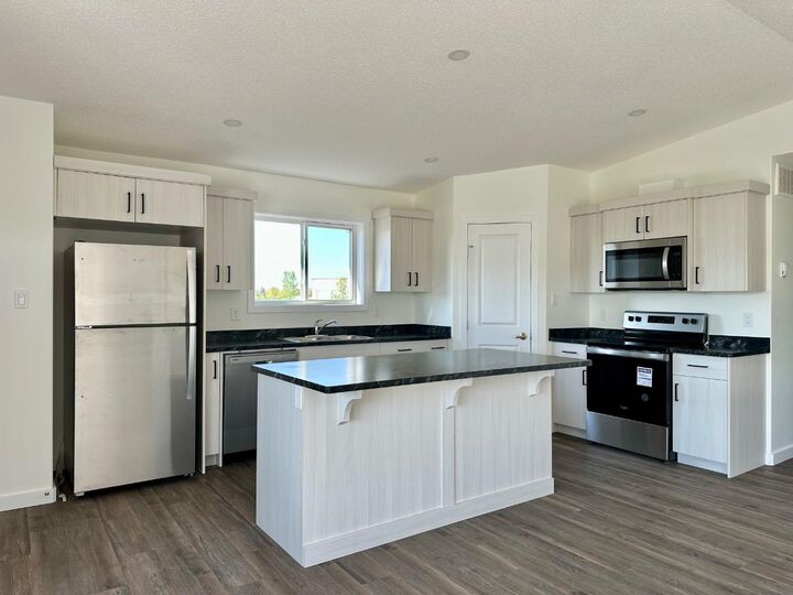 Property Photo:  1232 5 Avenue SW  AB T0G 2A4 
