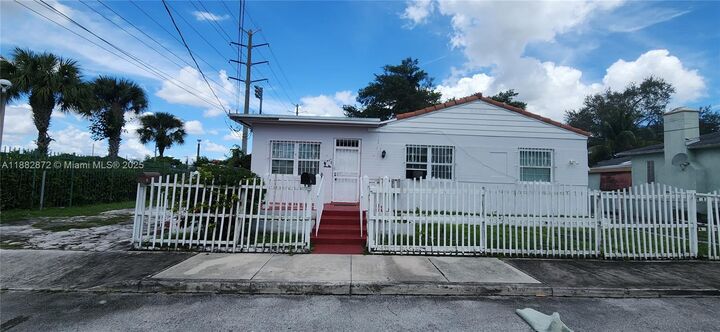 Property Photo:  405 NW 64th St 1  FL 33150 