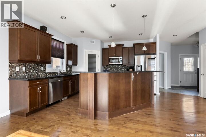 Property Photo: 6925 Maple Ridge Drive SK S4X 4J2