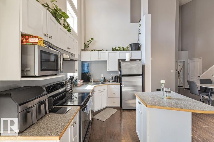 Property Photo:  151 Edwards Drive SW 208  AB T6X 1N5 