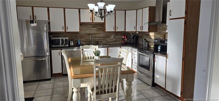 Property Photo:  48 31 Ième Avenue  NB E3V 2R5 