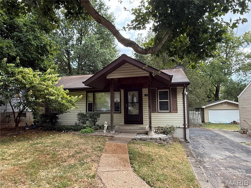 Property Photo:  144 Flora Drive  MO 63135 