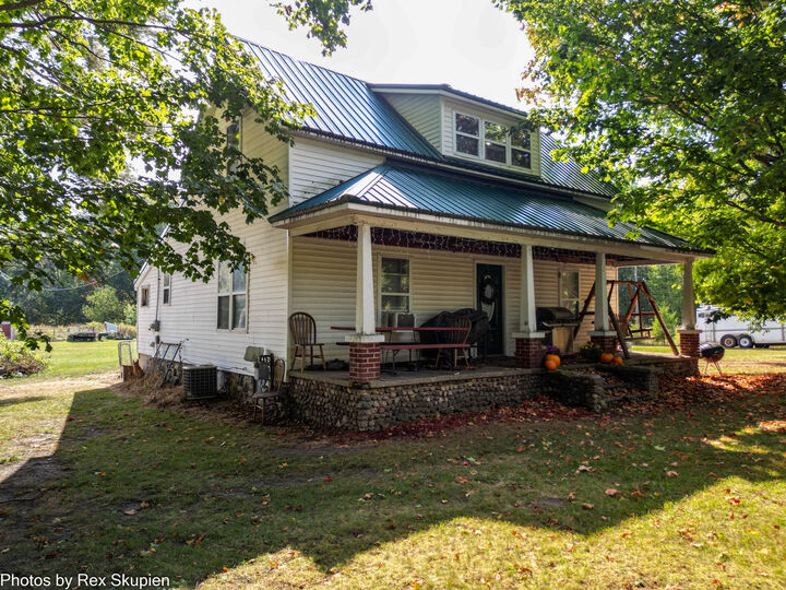 Property Photo:  9435 E Garfield Road  MI 49421