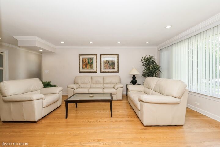 Property Photo:  8231 Harding Avenue  IL 60076 
