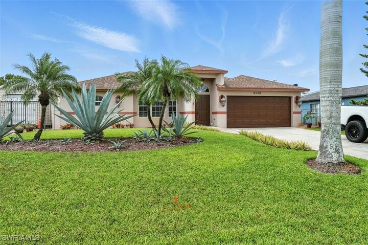 Property Photo:  8450 Blackberry Road  FL 33967 
