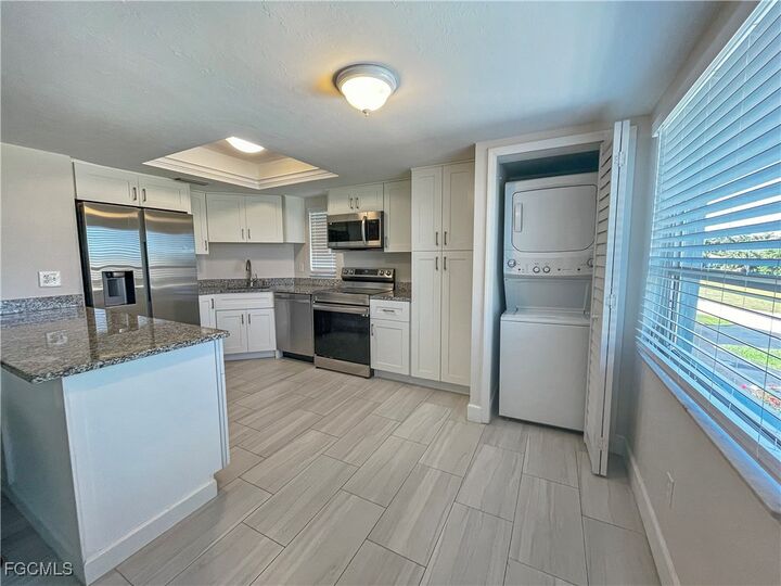 Property Photo:  5023 SW 16th Place 202  FL 33914 