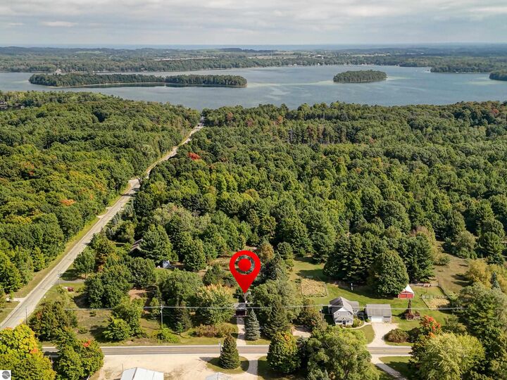 Property Photo:  2450 W Long Lake Road  MI 49685 