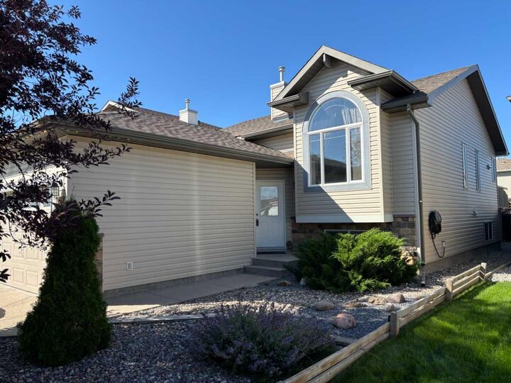 Property Photo:  208 Silkstone Bay W  AB T1J 2A2 