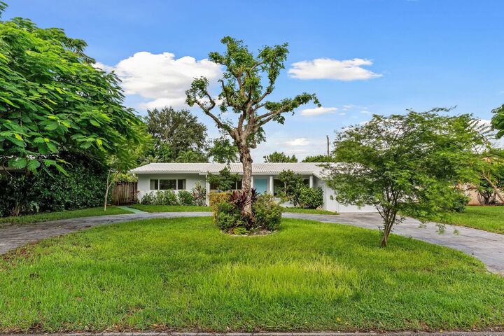 Property Photo:  919 NE 26th Avenue  FL 33062 