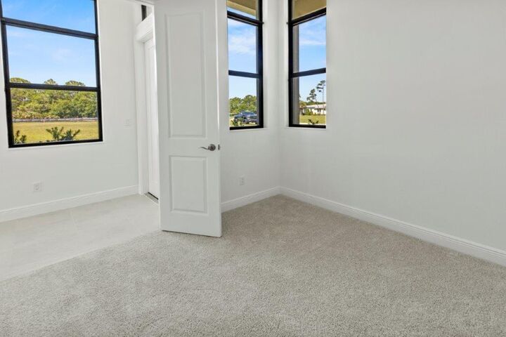 Property Photo:  320 SE Via Sangro  FL 34952