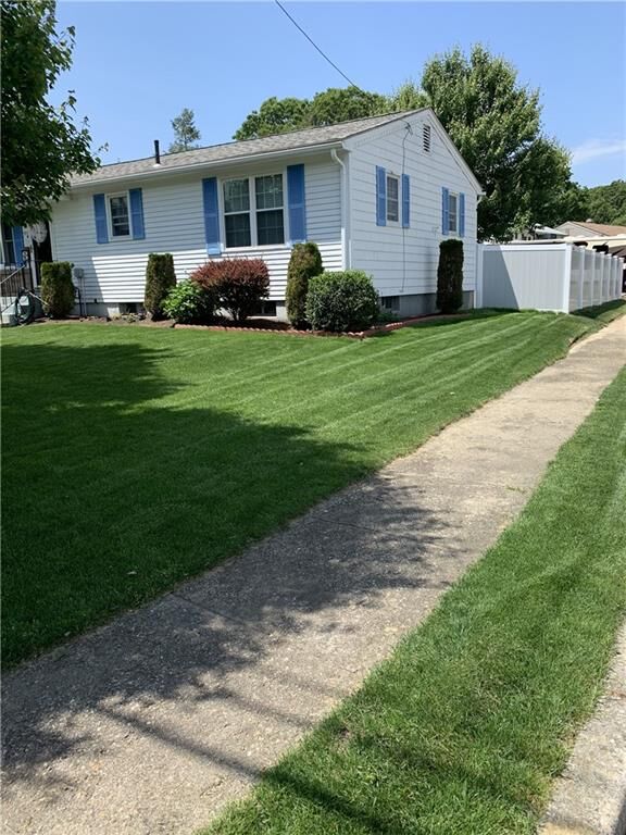 Property Photo:  91 Carnation Drive  RI 02886 