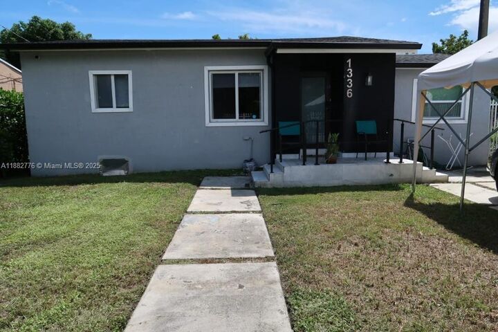 Property Photo:  1336 NW 38th St 1  FL 33142 