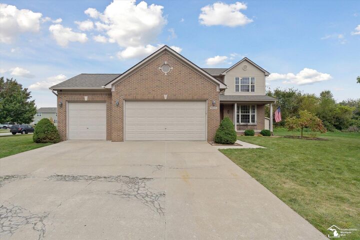 Property Photo:  9026 Rock Harbor Drive  MI 48166 