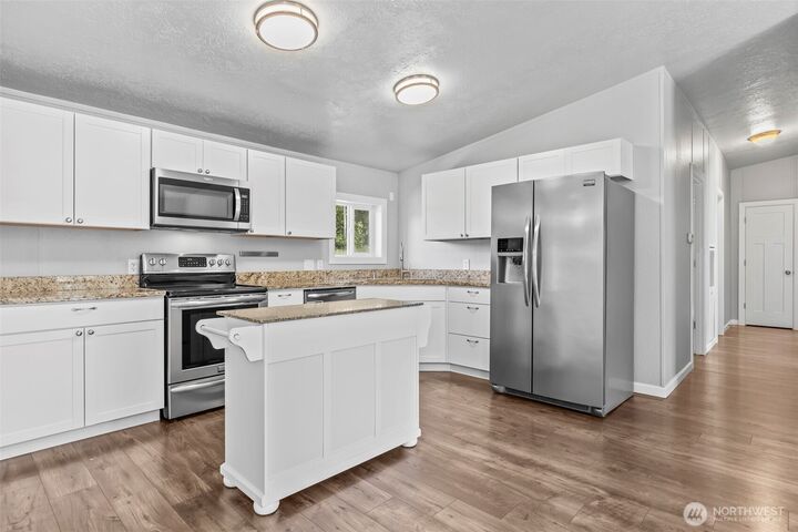 Property Photo:  6915  Stringtown Road E  WA 98328 