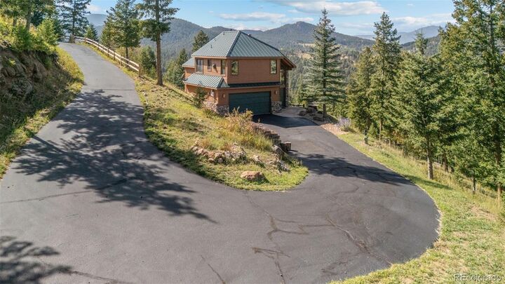Property Photo:  29541 Falcon Ridge Drive  CO 80439 