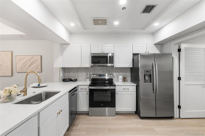 Property Photo:  1900 E Girard Place 201  CO 80113 