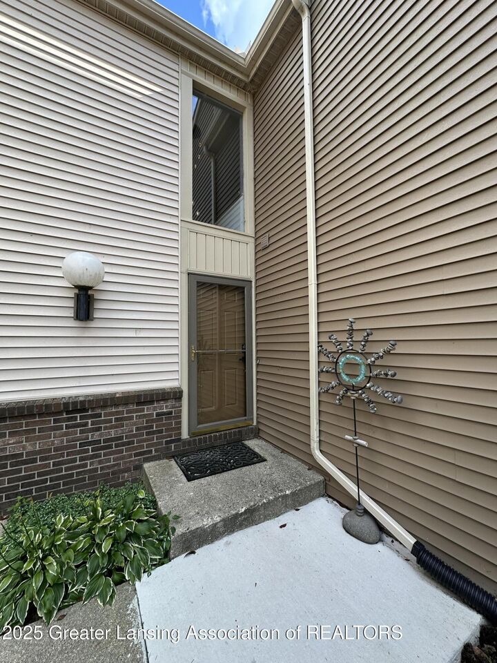 Property Photo:  5724 Lebaron Court  MI 48823 