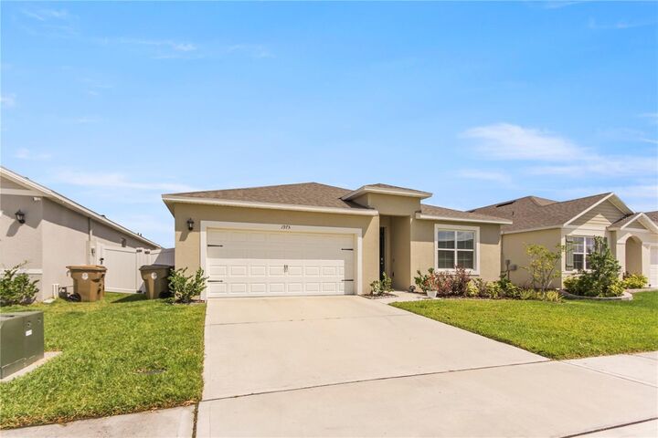 Property Photo: 1975 Cacutta Way FL 34744