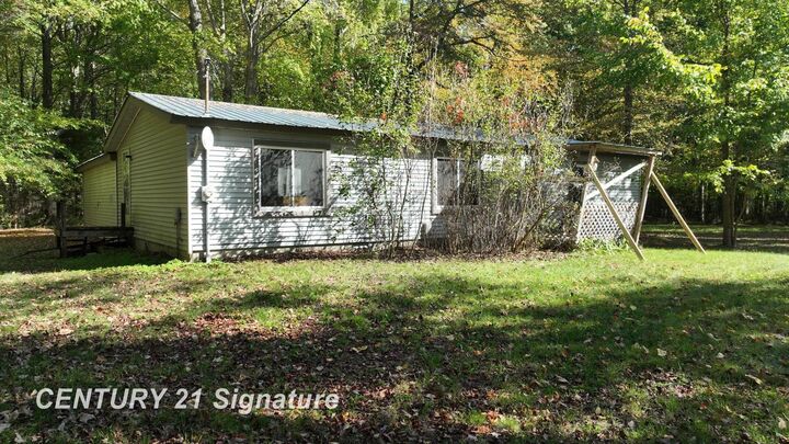 Property Photo:  3143 S Homer Road  MI 48637 