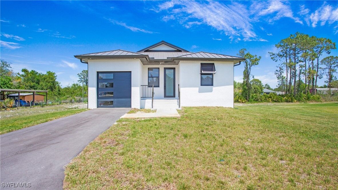 Property Photo: 2343 Oil Well (Unit 2) Road FL 34120