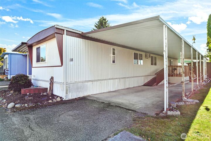 Property Photo:  16600  25th Avenue NE 18  WA 98271
