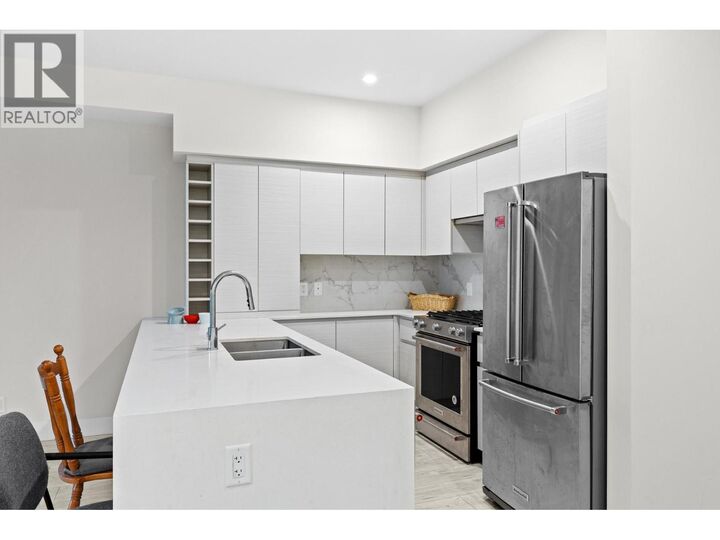 Property Photo: 1925 Enterprise Way 311 BC V1Y 0J8