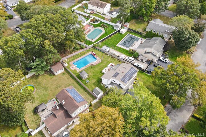 Property Photo: 5 Canterbury Drive NY 11727