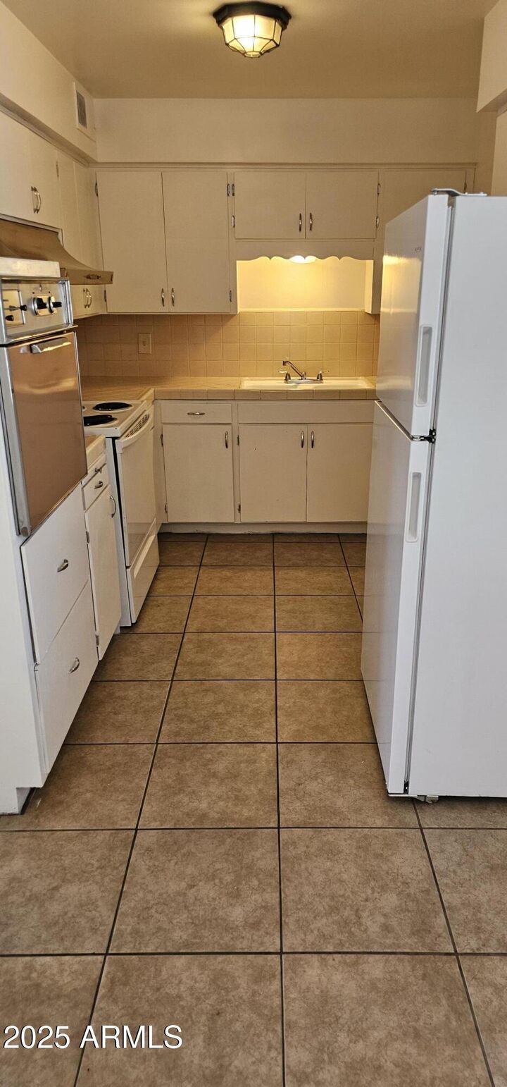 Property Photo:  104 S Allen -- B  AZ 85204 