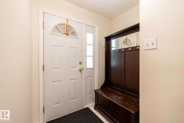 Property Photo:  15707 92 Avenue NW  AB T5R 5C5 