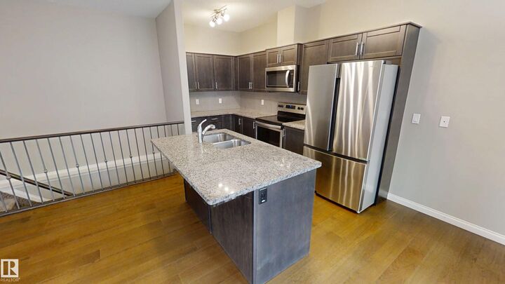 Property Photo:  18230 104A Street NW 59  AB T5X 0G9 