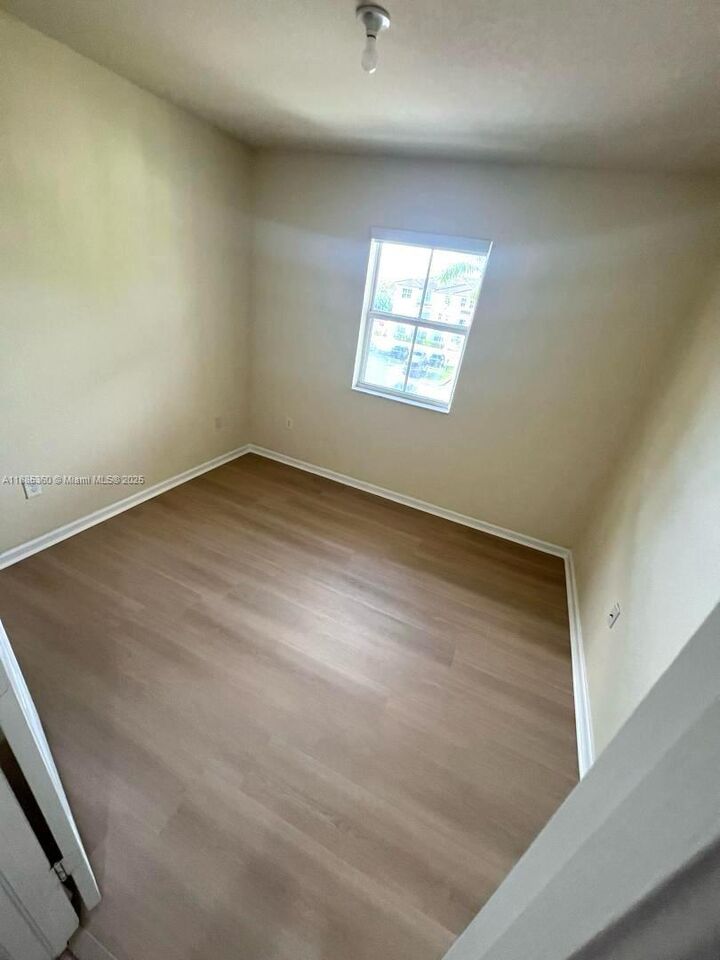 Property Photo:  11601 NW 89th St 211  FL 33178 