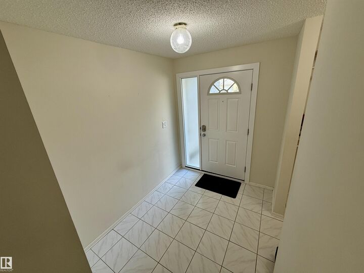 Property Photo: 221 Callingwood Place NW AB T5T 2C6