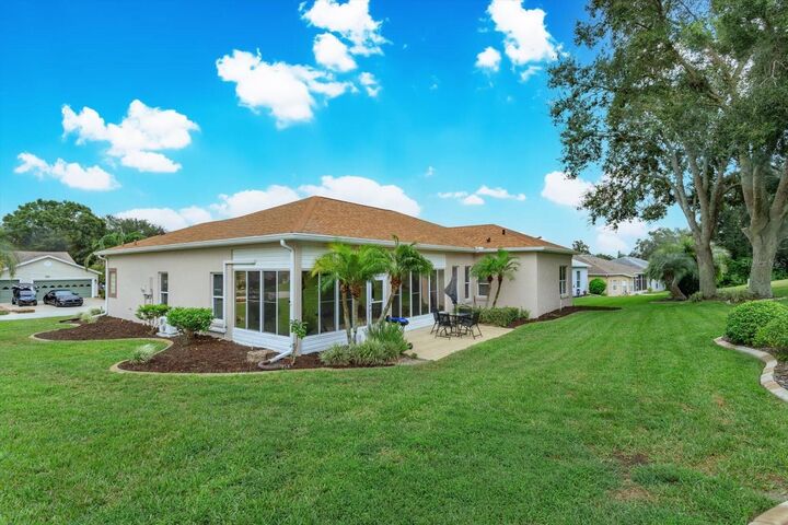 Property Photo:  5036 Sawgrass Lake Circle  FL 34748 