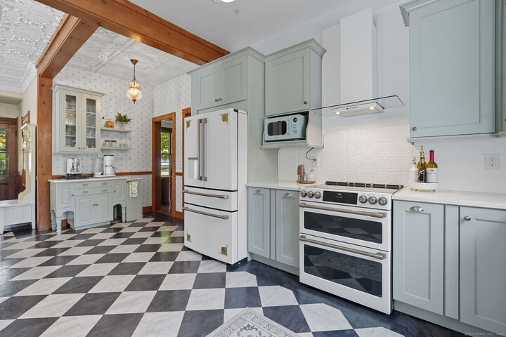 Property Photo:  1063 Main Street  CT 06074 