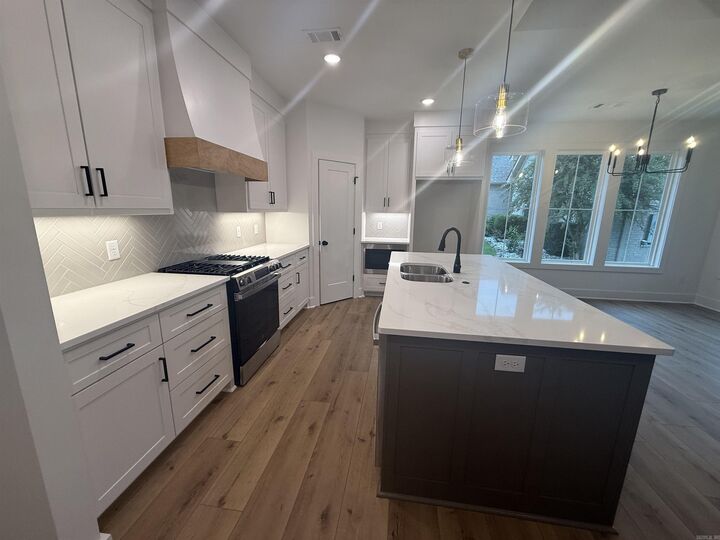 Property Photo:  1600 Canyon Maple Cove  AR 72019