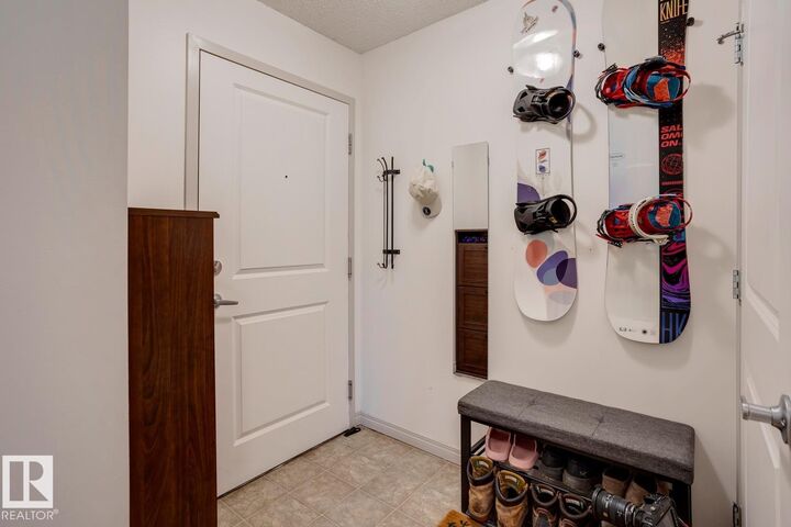 Property Photo: 11449 Ellerslie Road SW 218 AB T6W 1T2