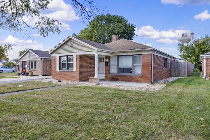 Property Photo: 11712 S Troy Drive IL 60803