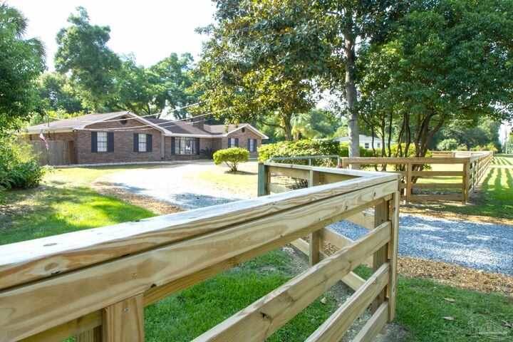 Property Photo:  605 N 69th Ave  FL 32506 