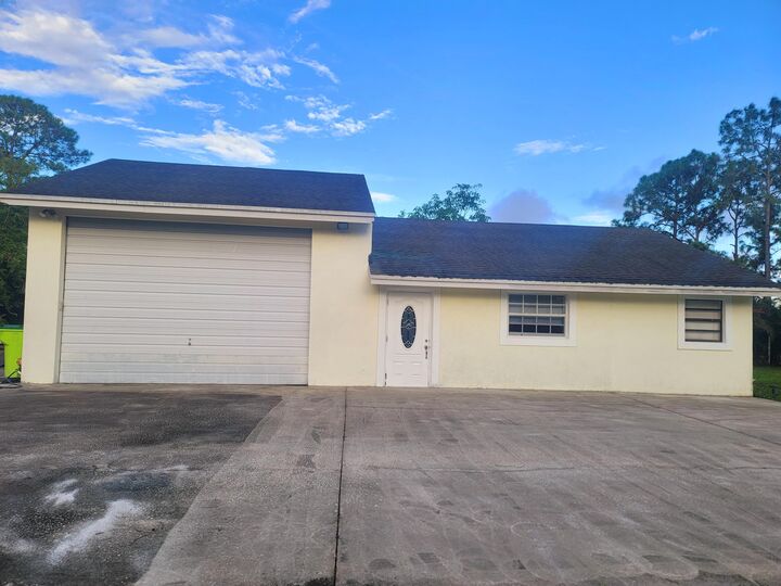 Property Photo:  15664 North Road A  FL 33470 