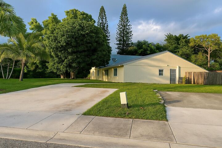 Property Photo:  4495 NW 3rd Drive  FL 33445