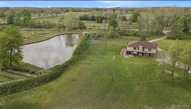 Property Photo:  7031 Munsell Road  MI 48843 