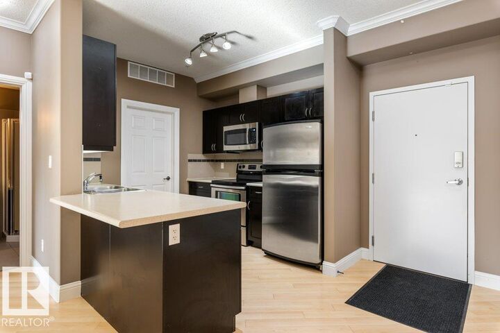 Property Photo: 14604 125 Street NW 104 AB T5X 0B4