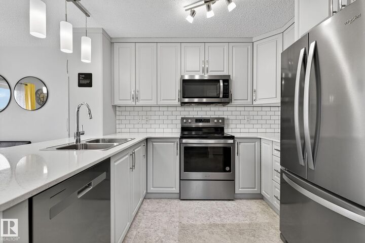 Property Photo: 527 Ebbers Way NW AB T5Y 3T8
