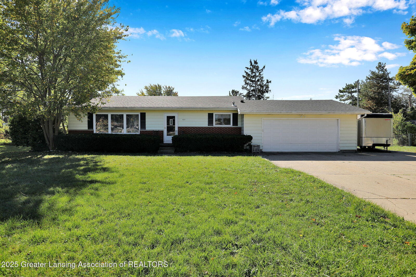 Property Photo: 4311 Woodhaven Drive MI 48917