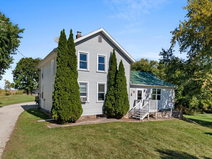 Property Photo:  12024 Point Creek Rd  WI 53063