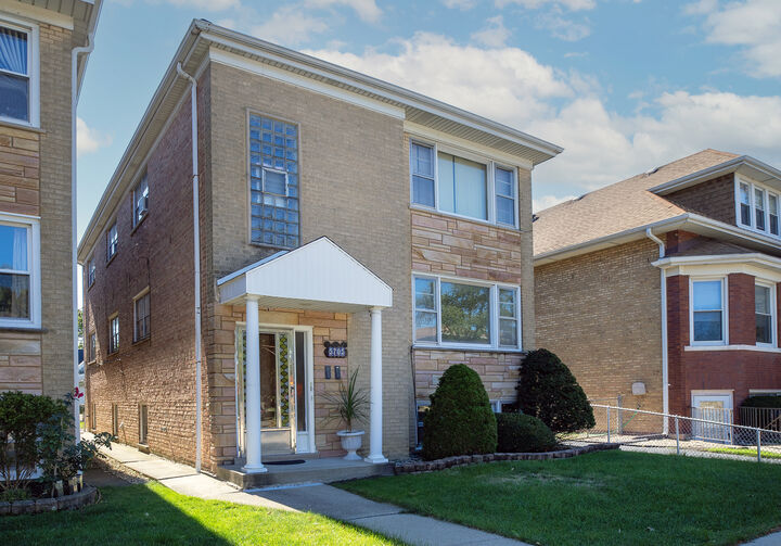 Property Photo:  5705 W Higgins Avenue  IL 60630 