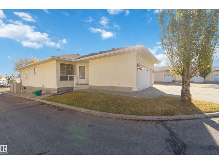 Property Photo: #1 14428 Miller Bv NW AB T5Y 2Y6